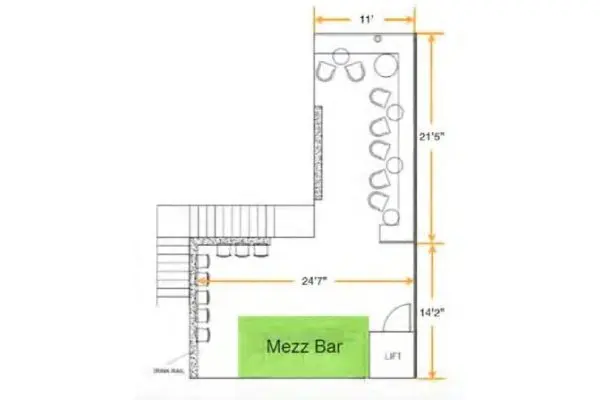 A floor plan of a bar with a green sign.