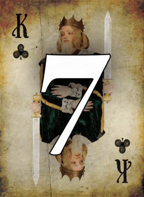 A number seven on top of an old playing card.