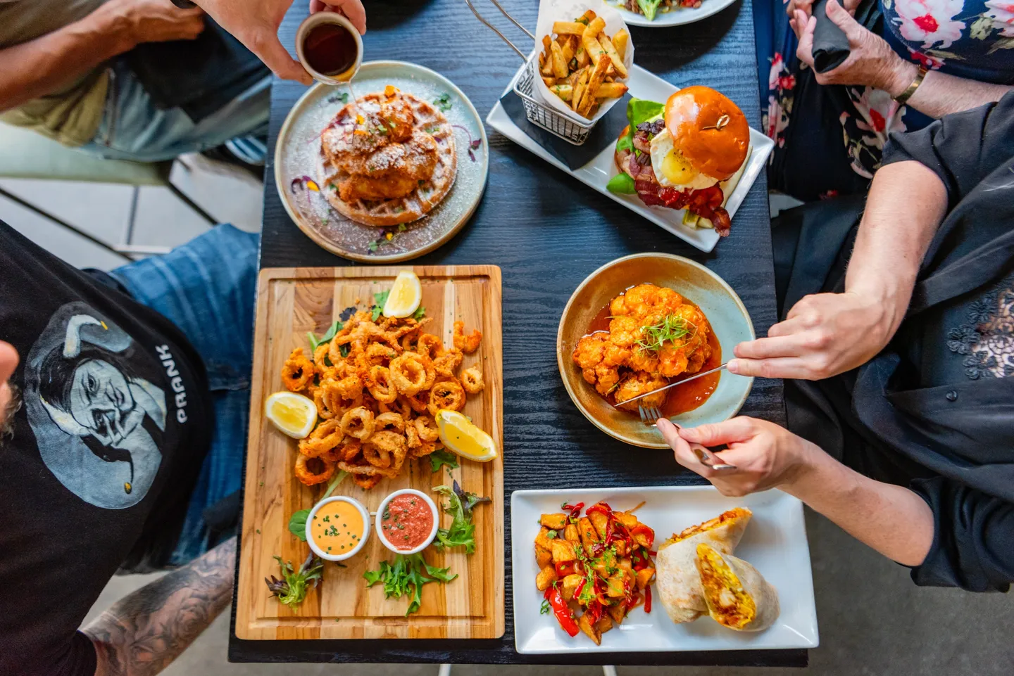 A table with many different foods on it